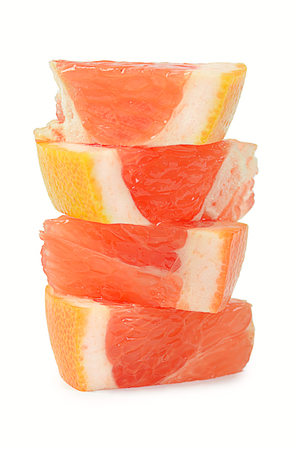 The bright grapefruit isolated on white backgroundの写真素材