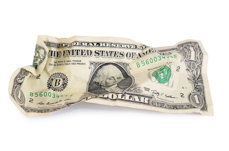 The crumpled dollar bills isolated on whiteの写真素材