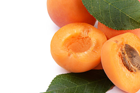 The fresh apricot with a leaf isolatedの写真素材