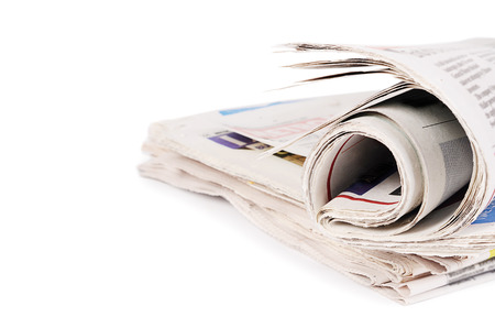 The combined newspapers isolated on white background