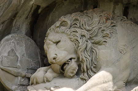 Statue of a dying lion in Lucerneの写真素材