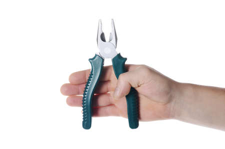 Pliers in man's hand  isolated on white