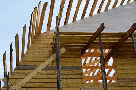 Construction of the wooden house close upの写真素材