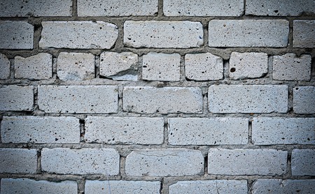 Wall from a white brick close up