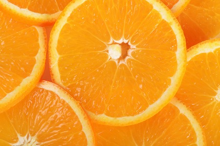 The fresh orange as a background closeup