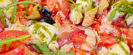 Italian pizza with cheese and olives macroの写真素材