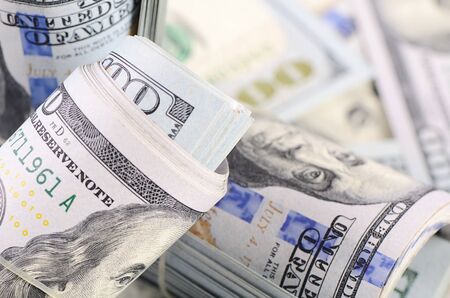 The hundred dollar banknotes as a background