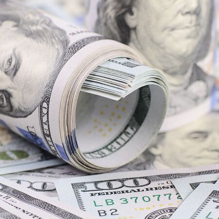 The hundred dollar banknotes as a background