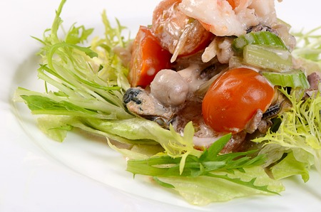 The fried seafood with vegetables close upの写真素材