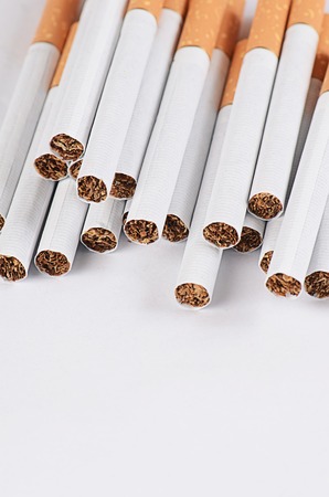 Close-up of Tobacco Cigarettes Background or textureの写真素材