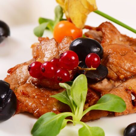 Turkey fillet stewed in sauce with grapesの写真素材