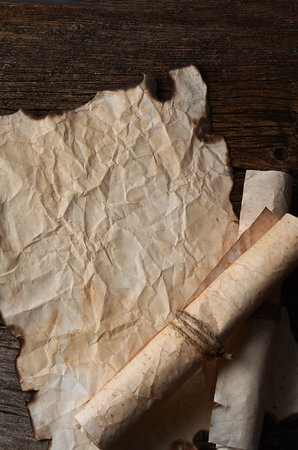 Old crushed paper with the burned edgesの写真素材
