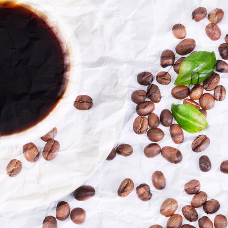 The coffee beans in a cup close-upの写真素材