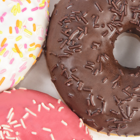 Fresh donut with sugar glaze close upの写真素材