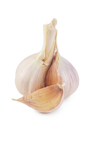 Fresh garlic closeup isolated on a white backgroundの写真素材