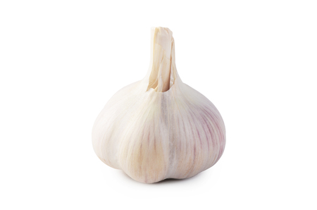 Fresh garlic closeup isolated on whiteの写真素材