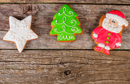 Gingerbread winter Christmas tree on wooden backgroundの写真素材