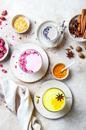 Variety of Moon Milk for a better sleep. Turmeric golden milk, pink rose milk and lavender moon milk. Trendy relaxing bedtime drinkの写真素材
