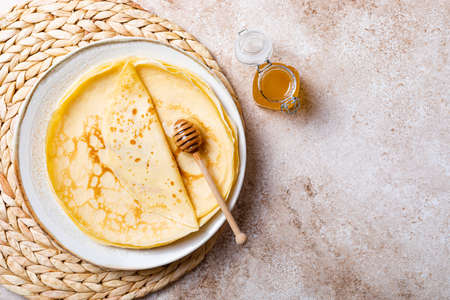 Homemade crepes pancakes with ricotta and fresh oranges. French Crepe Suzette with bloody oranges...