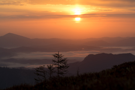Beautiful mountain landscape. Sunrise over the mountain range.の写真素材