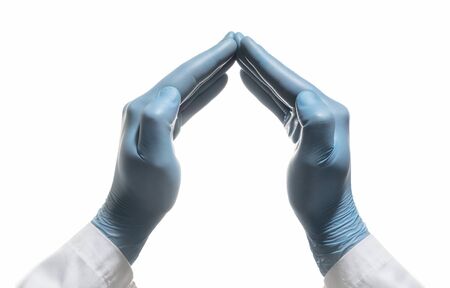 Gesture from doctor's hands as metaphor of care, protect, rescue. Isolated on white