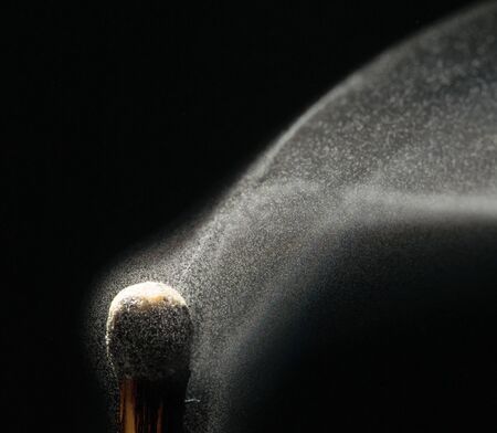 Smoke on a burnt match. Close-up. Macro photography.の写真素材