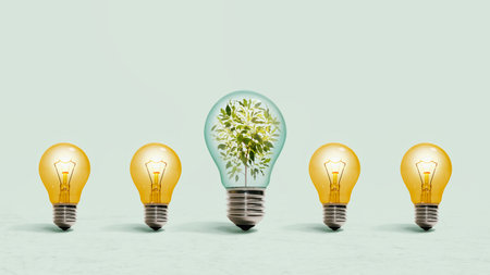 Energy saving light bulb between incandescent bulbs. Renewable energy concept.
