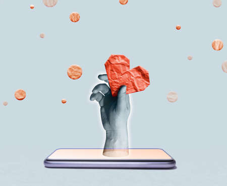 Art collage with smartphone, human hand and red paper heart. Ð¡oncept of dating, aid, charity.の写真素材
