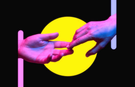 Do not leave me! Hands of a man and a woman in neon light. Art collage. Breaking up a relationship.の写真素材