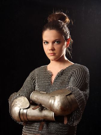 The girl in a medieval knightly armourの写真素材