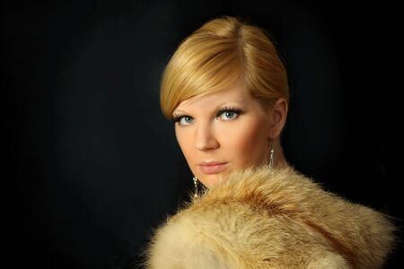 The beautiful girl in a fur coat
の写真素材