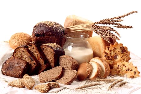 A lot of different bread on a white background