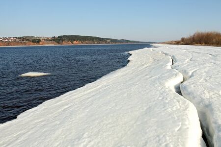 Early spring. Ice on river bank Kama. Russia, the Udmurt republic.の写真素材