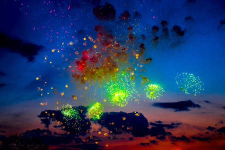 Colorful fireworks light up the night sky with dazzling displayの写真素材