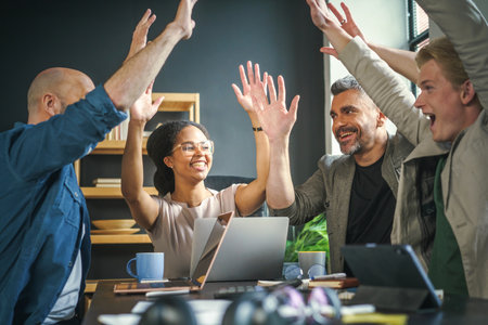Essence of teamwork, collaboration, and accomplishment within professional office environment. Unity...