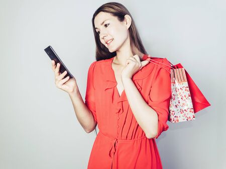 Happy woman in a red dress