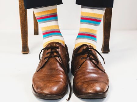 Men's feet in stylish shoes and bright socks. Men's styleの写真素材