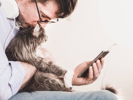 Cute man and cute kitten