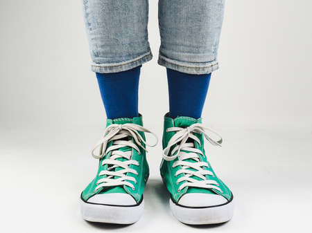 Stylish sneakers and funny, happy socksの写真素材