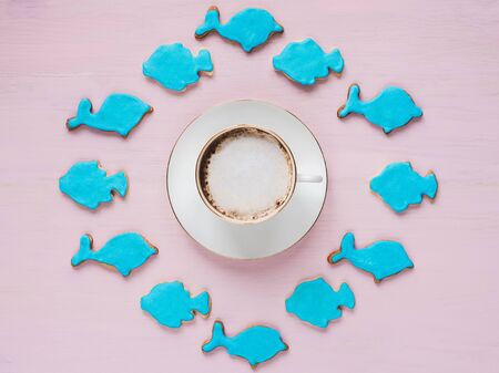 Coffee and a festive cookiesの写真素材