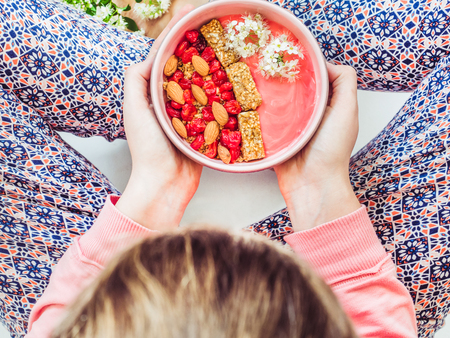 Berry smoothie and muesli with nutsの写真素材
