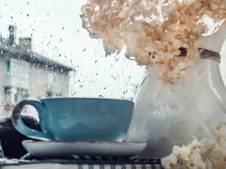 Cup of strong coffee, bouquet of beautiful flowersの写真素材