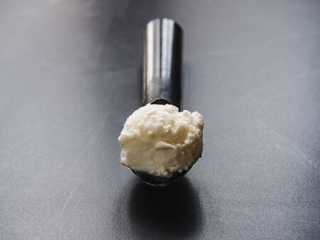 Bright, flavor ice cream. Isolated background. Close-up, top view. Concept of tasty and healthy foodの写真素材