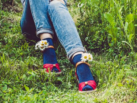 Womens legs, fashionable shoes and bright socksの写真素材