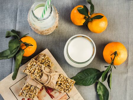 Fresh, fragrant handmade cookies, lying on a cutting board and jam of orange slices. Close-up, side view. Tasty and healthy eating conceptの写真素材
