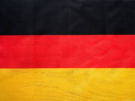 German Flag. Beautiful greeting card. Close-up, view from above. National holiday concept....