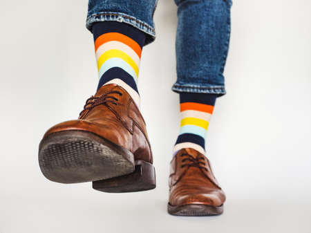 Mens legs, trendy shoes and bright socks
