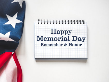 Memorial Day. American Flag and congratulatory inscription. No people. Closeup, top view. National holiday concept. Congratulations for family, relatives, friends and colleaguesの写真素材