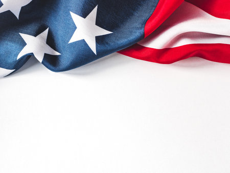 American Flag on white background and space for Your congratulatory inscription. Greeting card. Studio shot. Congratulations for family, loved ones, relatives, friends and colleaguesの写真素材