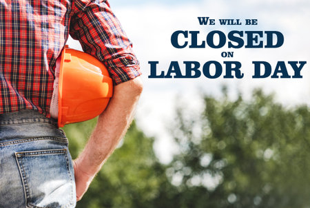 Signboard with the inscription We will be closed on Labor Day. Congratulations for family, loved ones, friends and colleagues. Holiday preparation conceptの写真素材